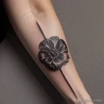 close-up of a black carnation tattoo on a woman s tatufoto.com 232