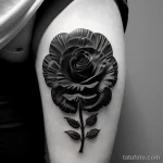 close-up of a black carnation tattoo on a woman s tatufoto.com 242