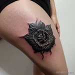 close-up of a black carnation tattoo on a woman s tatufoto.com 243