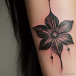 close-up of a woman’s wrist tattoo, faded over years tatufoto.com 094