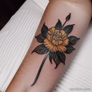 close-up of a yellow carnation tattoo on a woman s LV3LI9P2 tatufoto.com 275