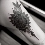 detailed black and white tattoo on a woman’s wrist, close-up tatufoto.com 269