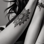 detailed black and white tattoo on a woman’s wrist, close-up, tatufoto.com 283
