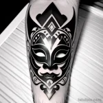 modern venetian mask tattoo in black and white tatufoto.com 079