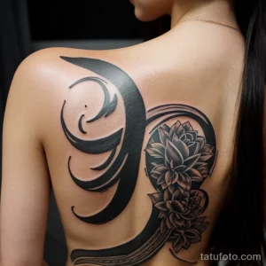 script tattoo on a woman’s ribcage, black ink, detailed, tatufoto.com 299