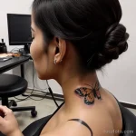 sensual woman with a butterfly tattoo on her neck tatufoto.com 072