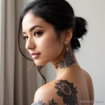 stylish woman with a tattoo on her collarbone, reflecting on changes tatufoto.com 199