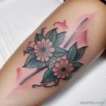 tattoo of a floral wreath on a woman s thigh tatufoto.com 197