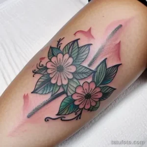 tattoo of a floral wreath on a woman s thigh tatufoto.com 197