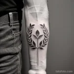 tattoo of a laurel wreath on a man s forearm tatufoto.com 220