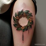 tattoo of a nature wreath on a woman s thigh tatufoto.com 233