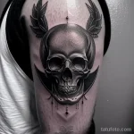 tattoo of a skull wreath on a man s bicep tatufoto.com 241
