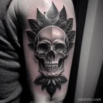 tattoo of a skull wreath on a man s bicep tatufoto.com 242
