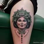tattoo of a wreath of ivy on a woman s thigh tatufoto.com 256