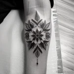tattoo of a wreath with thorns on a woman s forearm tatufoto.com 294