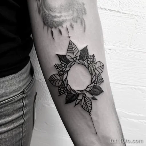 tattoo of a wreath with thorns on a woman s forearm tatufoto.com 295