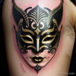 venetian mask tattoo in bold black ink with gold embellishments S2430381932 St40 G12 tatufoto.com 145