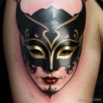 venetian mask tattoo in bold black ink with red and gold highlights S2430381932 St40 G12 tatufoto.com 151