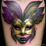 vibrant venetian mask tattoo with feathers tatufoto.com 265