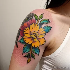 yellow carnation tattoo on the shoulder blade tatufoto.com 359