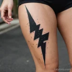 upper inner thigh macro, vitiligo shaped like lightning, matching tattoo of bolt using black and white contrast technique to nat 2025 №58 - фото tatufoto.com