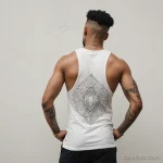 young man with vitiligo running down spine, wearing tank top pulled up, geometric tattoo in fine dotwork descending spine over w 2025 №61 - фото tatufoto.com