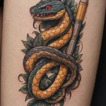 close up, a neo traditional tattoo of a pencil and a snake №42 - tatufoto.com