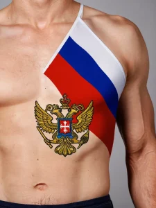 Фото тату на груди с изображением российского герба и флага. Яркие цвета, детальная проработка символики, патриотический дизайн.