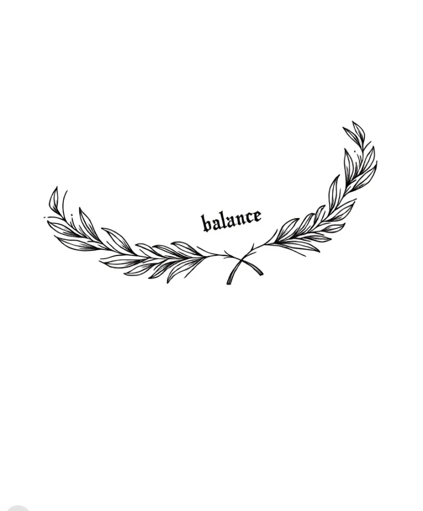 Black and white collarbone tattoo: a thin branch with leaves forming a semicircle, the inscription 'balance' in the center, minimalist design.