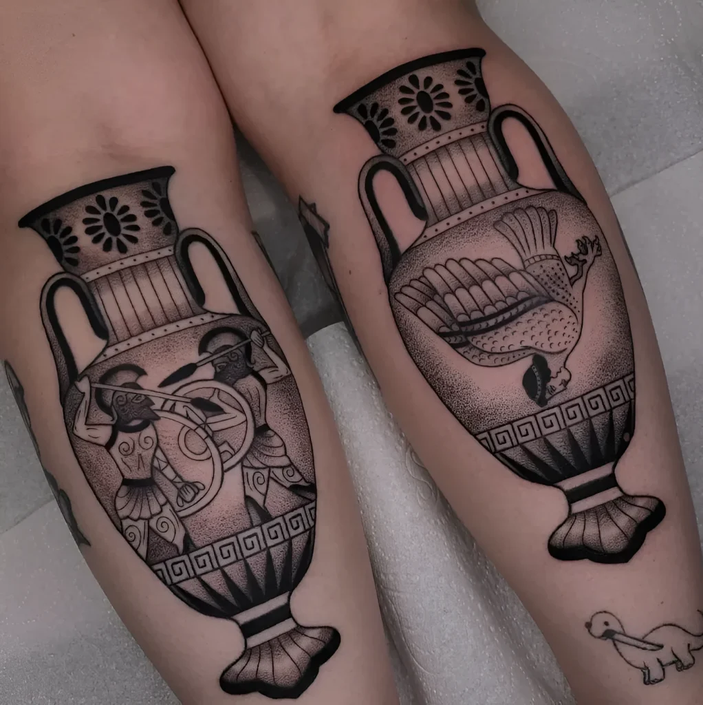 Black and white calf tattoo depicting an ancient Greek amphora decorated with figures and geometric ornament.