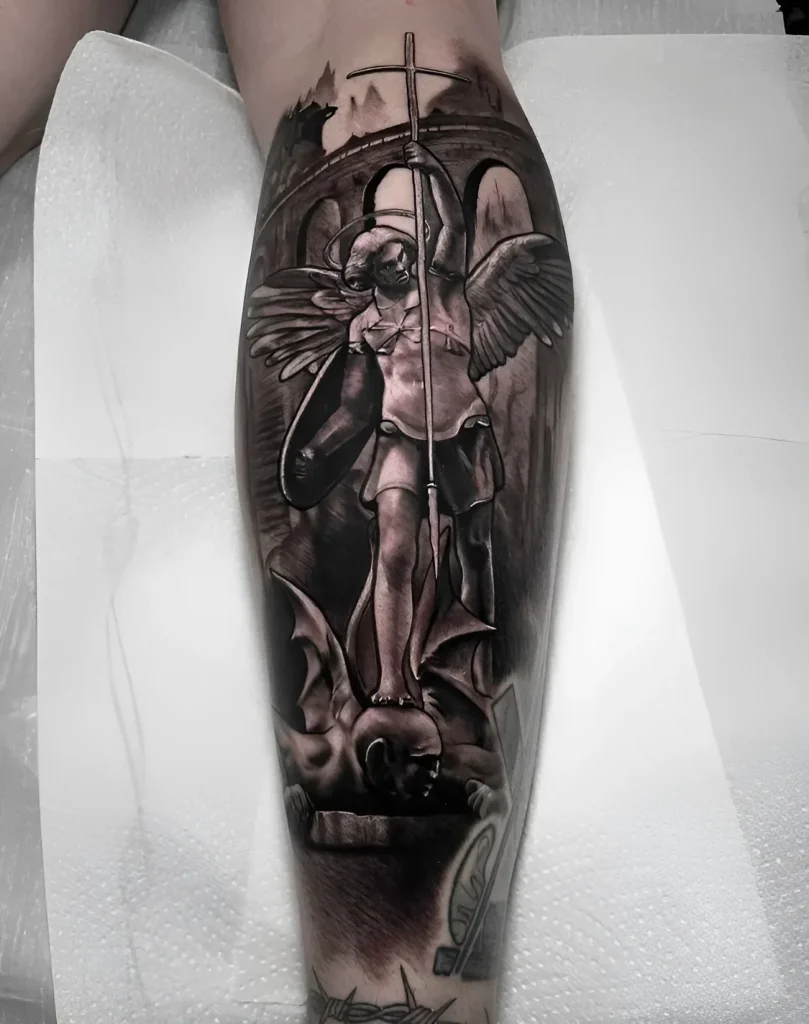 Black and white angel tattoo with a sword on the calf, done in realism style with elements of a dark background and mountain landscape.