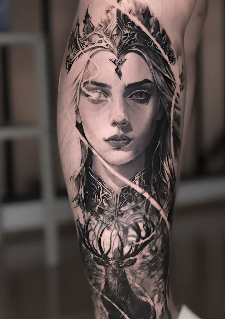 Black and white calf tattoo: realistic portrait of a girl in a crown of branches and leaves, transitioning into an image of a deer with branched antlers.