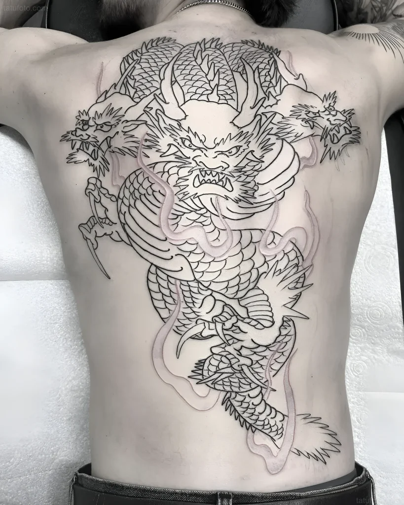 Large-scale outline tattoo of a multi-headed Hydra on the back in Japanese graphic style