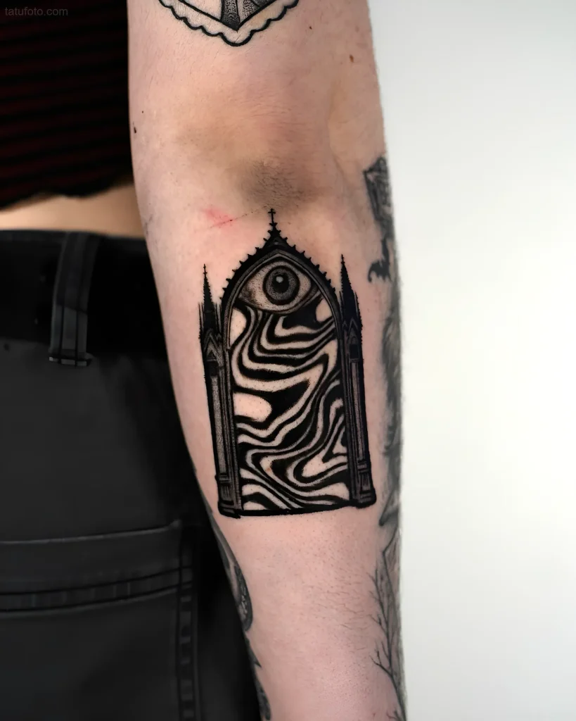 Portal tattoo with an all-seeing eye and a psychedelic pattern